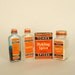 Tone's Spice Tin and Bottles in Orange and Black
