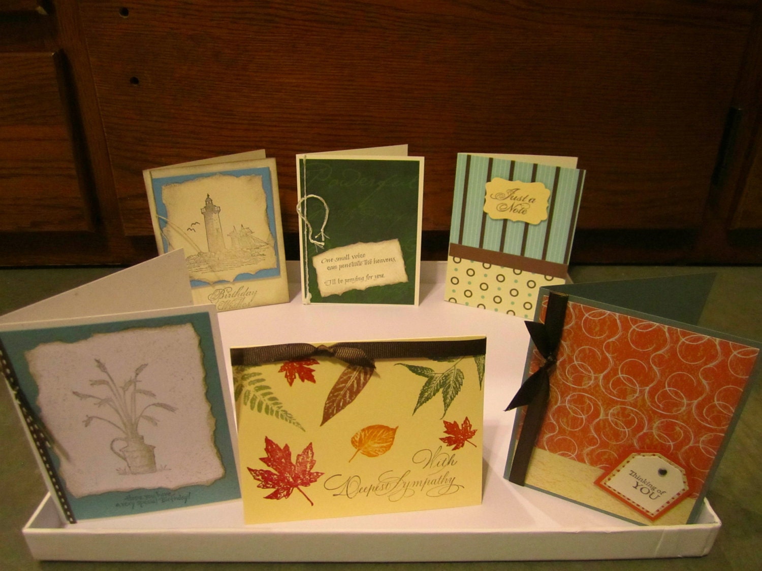 Set of six hand stamped cards.