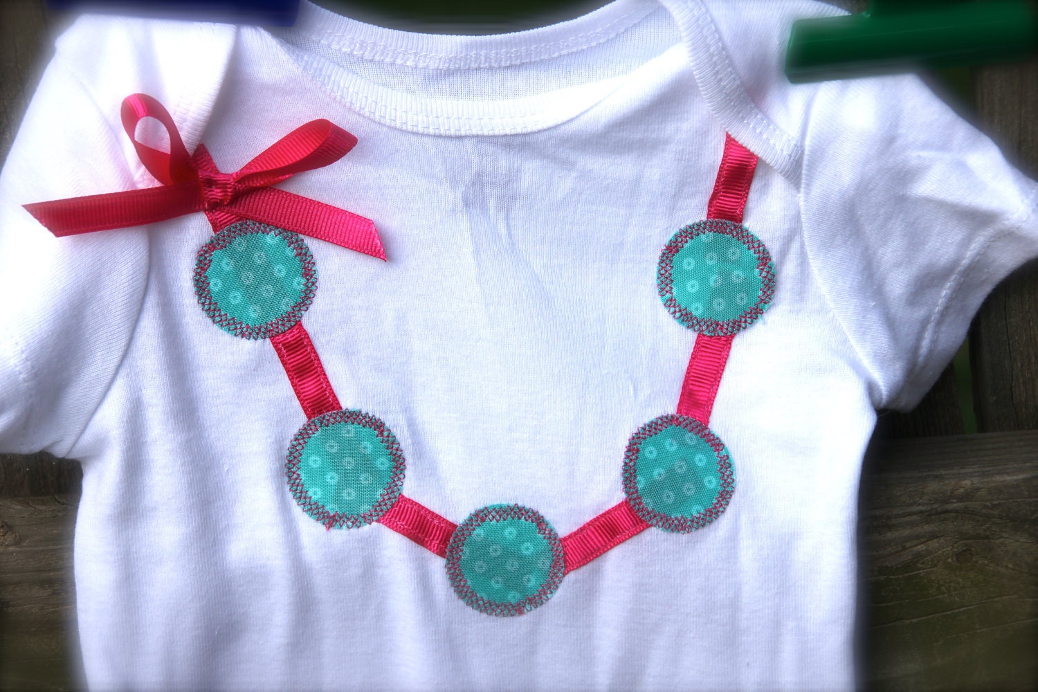 Aqua Polka Dot Necklace Onesie