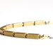 Pyrite & brass necklace: brass rectangles and pyrite beads on a long oxidized sterling silver chain