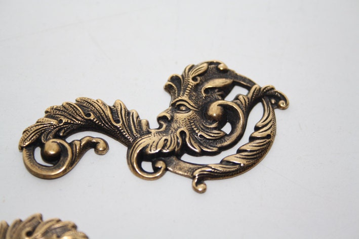 ornate fantasy pair - two beautiful ornaments left and right - antiqued brass