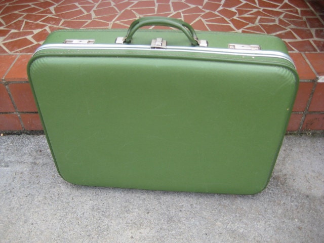 avacado green suitcase with green interior