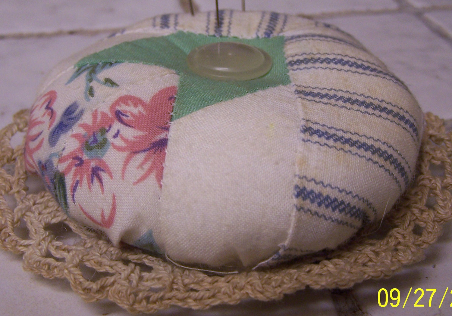 Recycled quilt and doily pin cushion