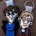 Sherlock Holmes or John Watson plush keychain