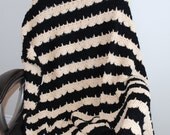 black and tan crochet lap throw