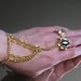 Gold and Emerald Slave Bracelet Ring w Golden Chains & Golden Hard durable jump rings.Ring is Golden Electro plated Emerald CZ Sz 9