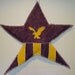 Handpainted burlap star in your school colors and mascot symbol or school initials.  29"w x 30"h