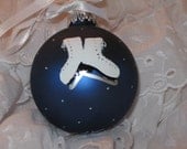 Hand painted figure skating ornament with personalization available.