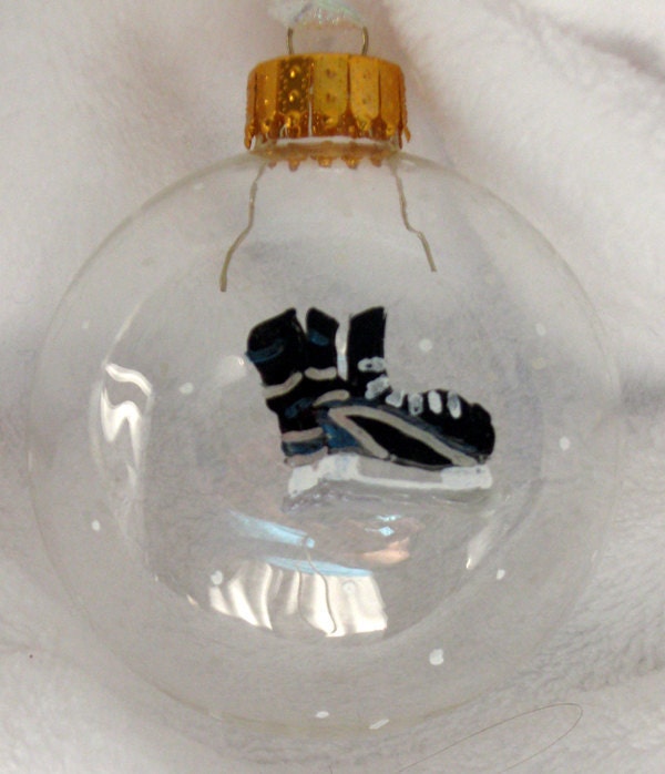 Hand painted Hockey Christmas Ornament with personalization available.
