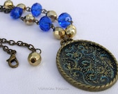 Victorian Cameo Necklace - a handmade pendant with royal blue and gold crystals