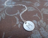 Custom engraved initial charm necklace on small sterling silver disc