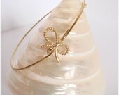 Pretty gold bow bangle