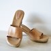 camel colored vintage slip on open toe/open heel Naturalizer leather pumps