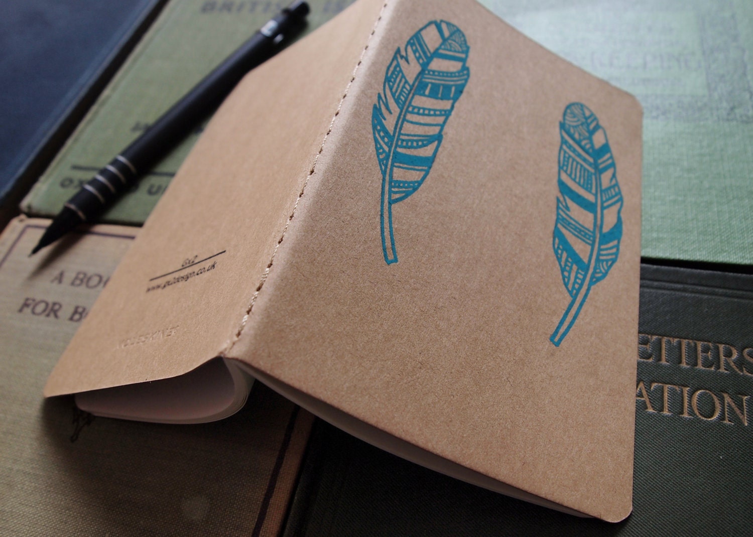 Hand Drawn Moleskine, turquoise feather