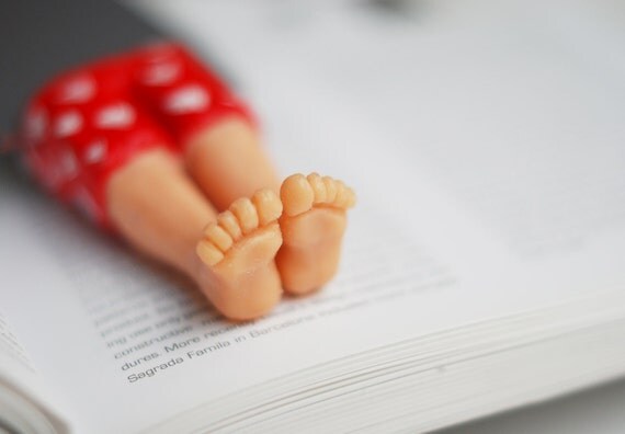 Real macho bookmark. Red pants with white hearts. Legs in the book. st. Valentine for her, him, for gay