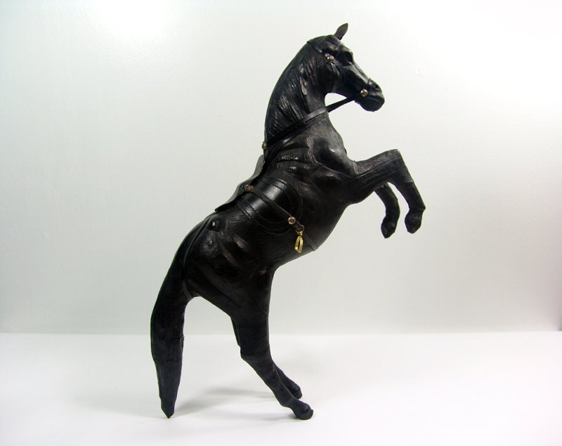 leather covered horse figurine