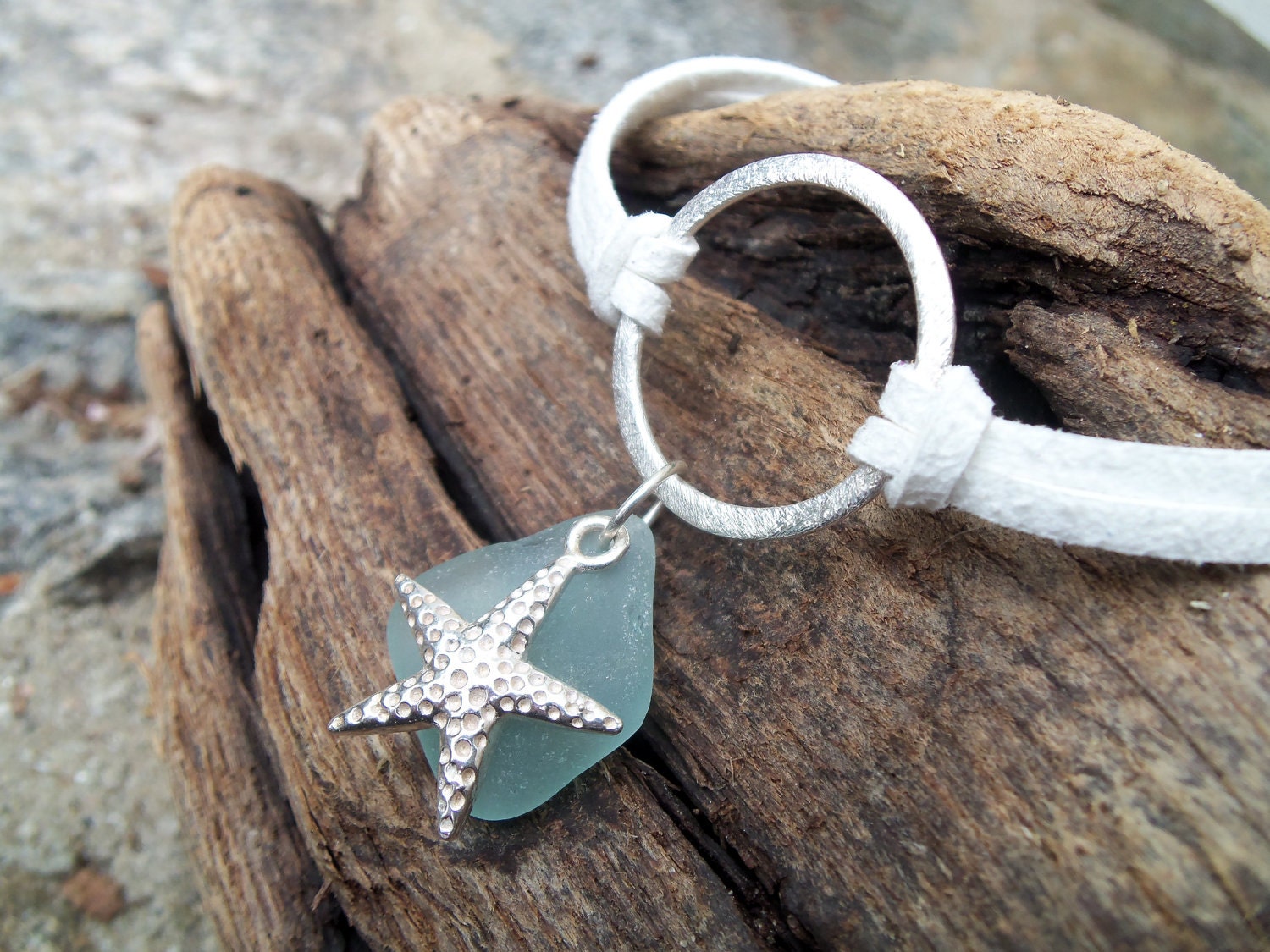 Sea glass jewelry, Pretty blue sea glass with starfish charm on white suede bracelet
