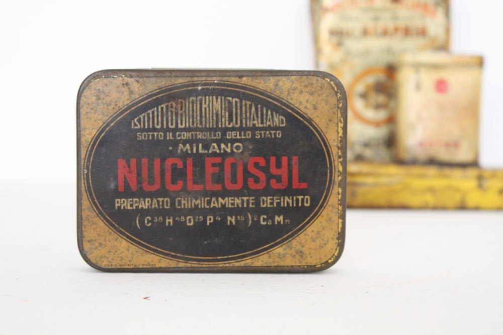 Vintage black and amber tin box