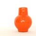 Vintage ceramic orange pitcher