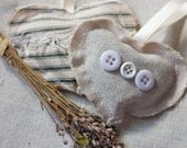 lavender pillows. Blue ticking fabric and linen with buttons ornaments for your bedroom dresser ornaments