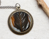 feather necklace resin bird jewelry circle filigree edge in bronze real natural nature animal safari prairie by studiobotanica