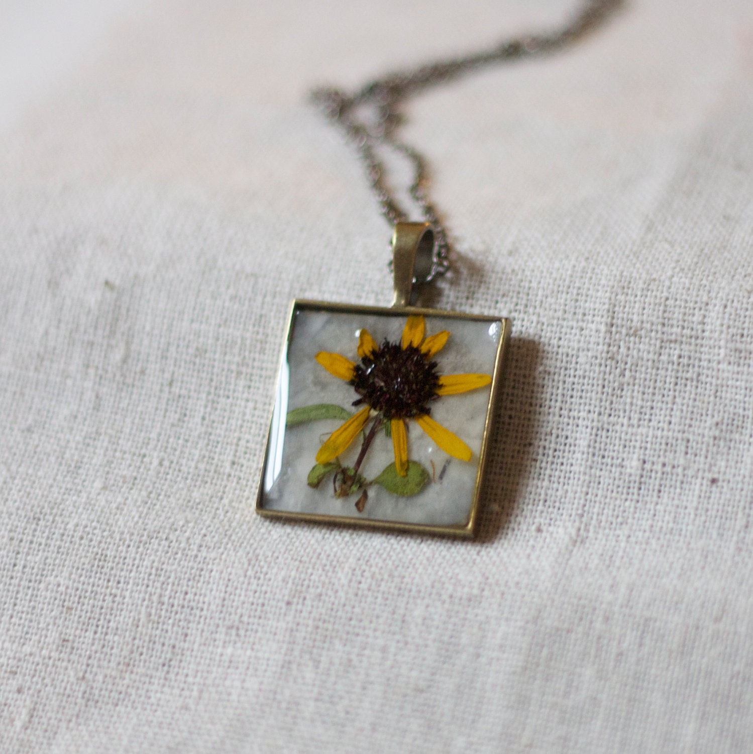 real pressed flower necklace resin necklace black eyed susan flower in resin. shabby chic square pendant for winter holiday. preserved.
