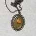 pressed flower necklace pink delphinium in bronze filigree setting resin jewelry shabby chic cottage farmhouse prairie