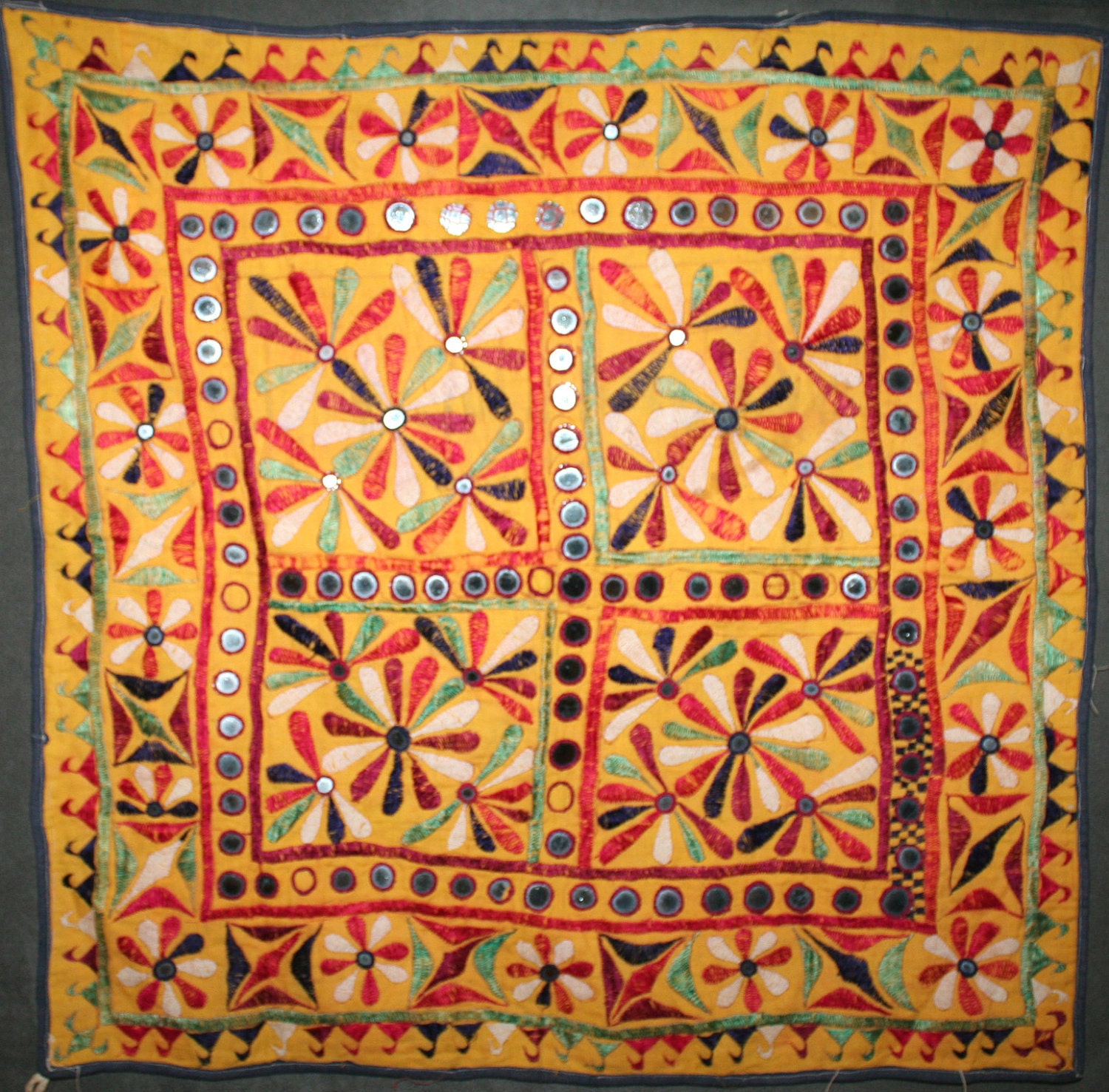 Pakistani wall hanging in yellow