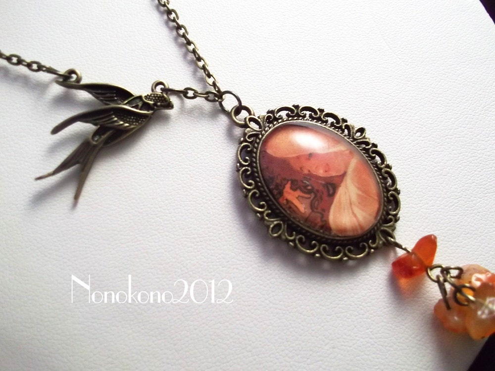 Vintage / Steampunk Style Alphonse Mucha cameo necklace with glass hearts