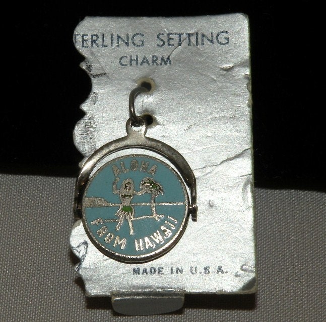 Sterling Enamel Spinner Charm on the original card