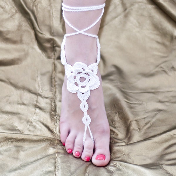 White crochet  barefoot sandals.