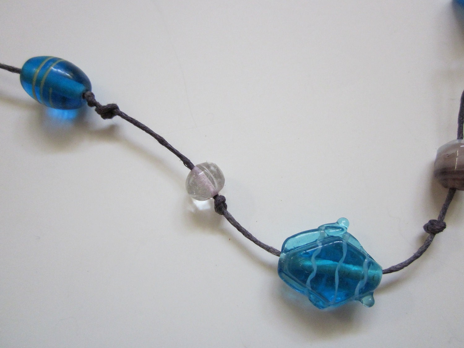 Discounted-Glass-Beaded Necklace on Purple Cord