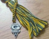 Green Bay Packers Bookmarker - Forest Green and Mustard Yellow NFL Book Thong with Official Silver Charm - Great gift for men or boys
