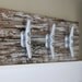 Nautical coat rack with boat cleats, made from reclaimed wood