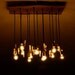 Live Edge Wood Chandelier with Antique bulbs and Quartz Crystals
