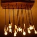 Live Edge Wood Chandelier with Antique bulbs and Quartz Crystals