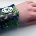 Unique Crochet Cuff: completely OOAK crocheted cuff in blue and green yarns, with blue / green flower button.