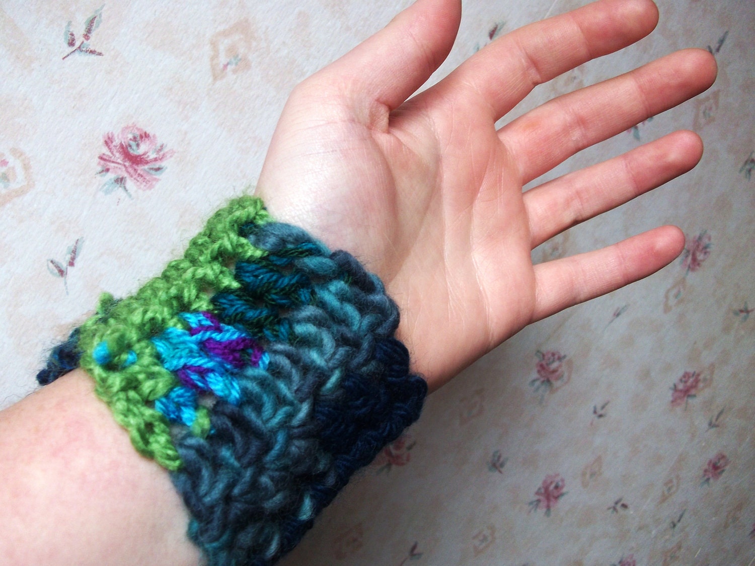Unique Crochet Cuff: completely OOAK crocheted cuff in blue and green yarns, with blue / green flower button.