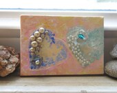 Twin  acrylic on canvas  hearts embellished with beads  token of affection