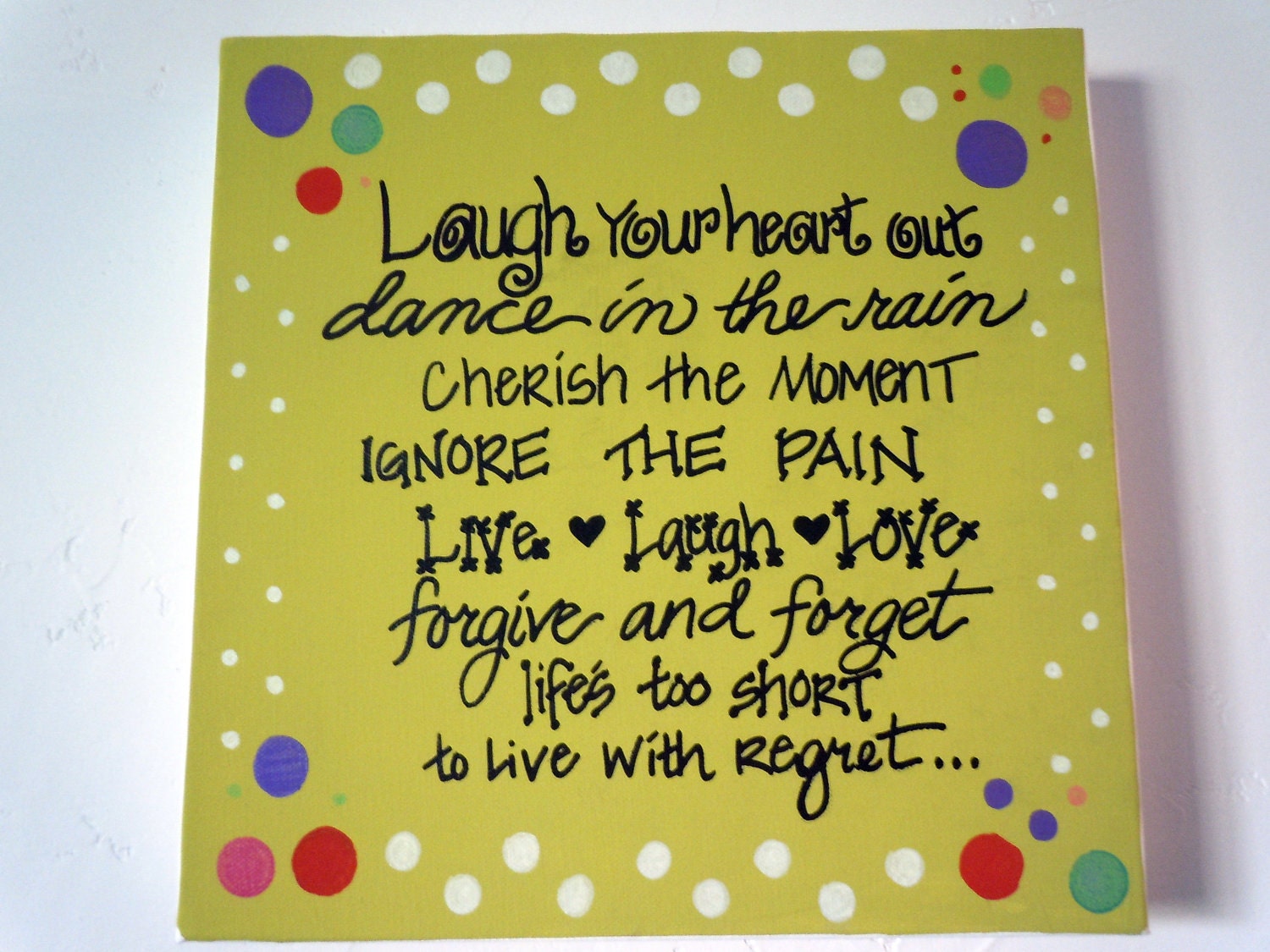 Hand-painted 12x12 canvas with fun design and inspiring quote about living with no regrets