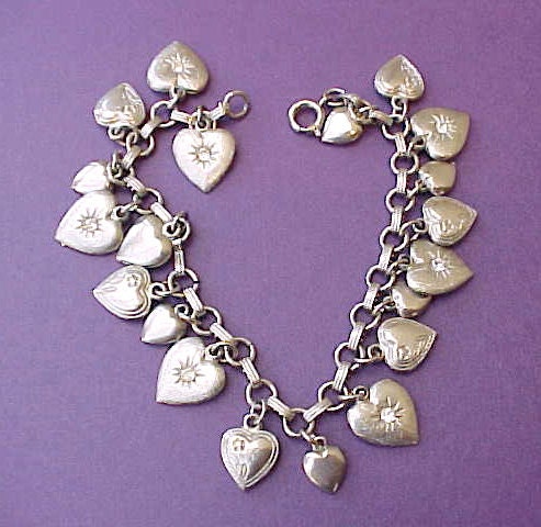 Lovely Vintage Charm Bracelet with 20 Little Heart Charms