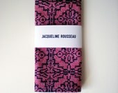 Screen printed red chambray pocket square with navy blue ink