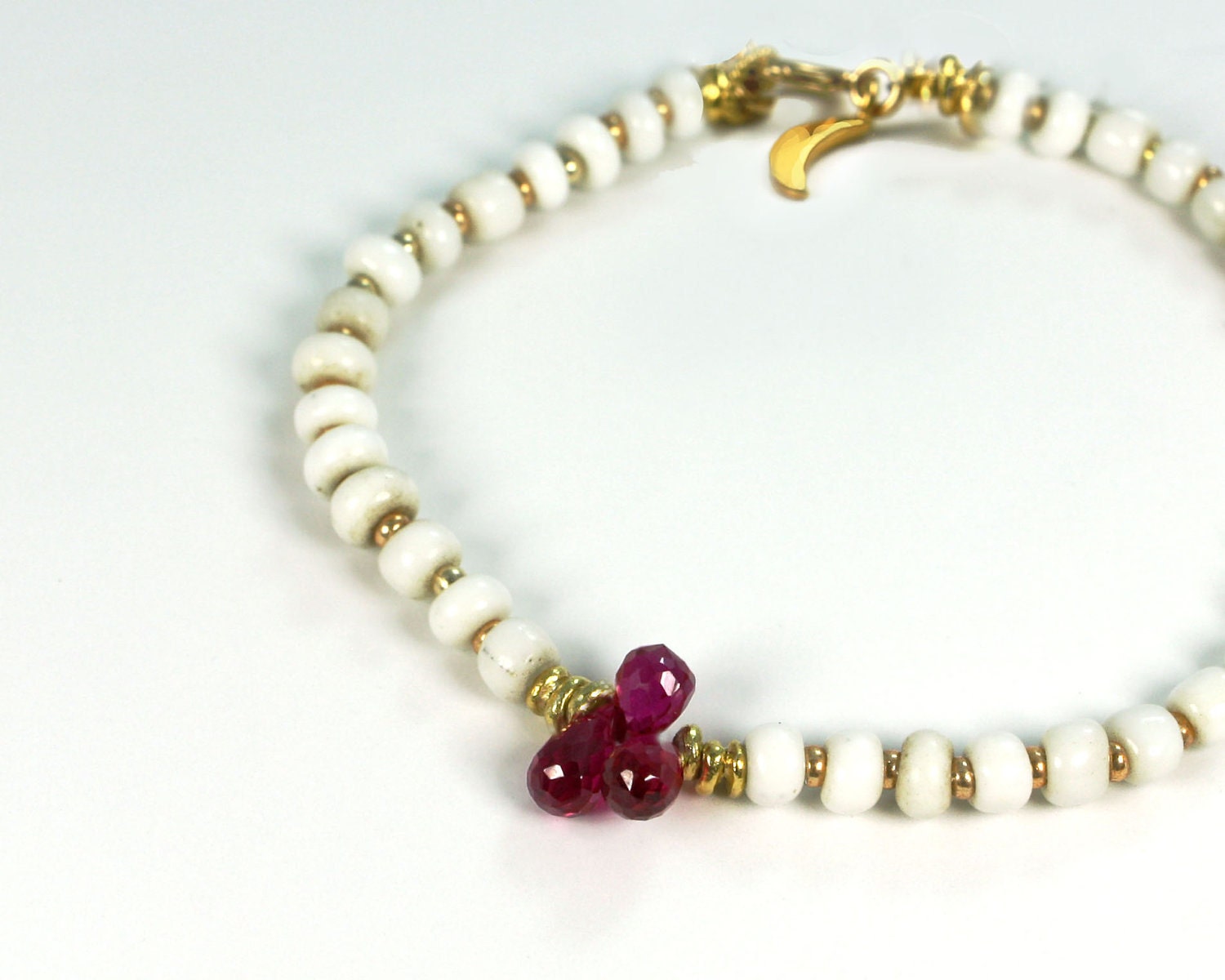 Gurlcha: Only women...Ruby and African bead bracelet or anklet. padre beads and dark red magenta bracelet or anklet with gold filled clasp