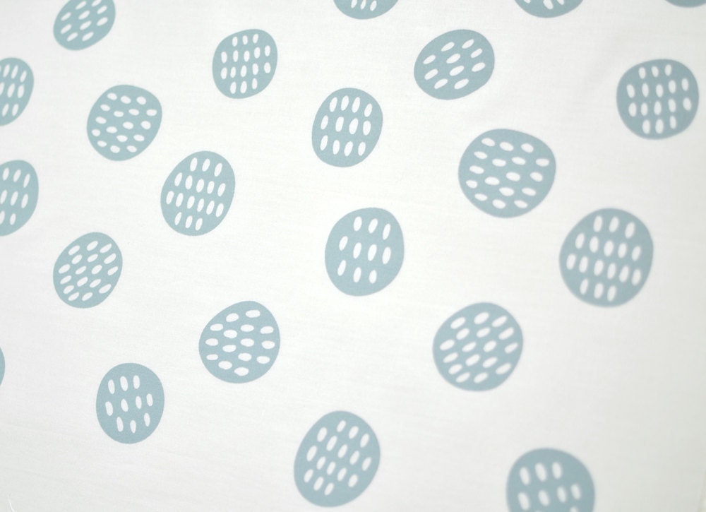 seedpods in overcast on bone quilting cotton handprinted fabric panel grey blue green
