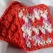 Eco friendly sunset orange sponges set of two crocheted cotton scrubbies dishcloth