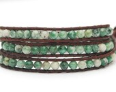 Beaded leather wrap bracelet. Green and white jade triple wrap leather bracelet with solid silver plated button. WSR3v012