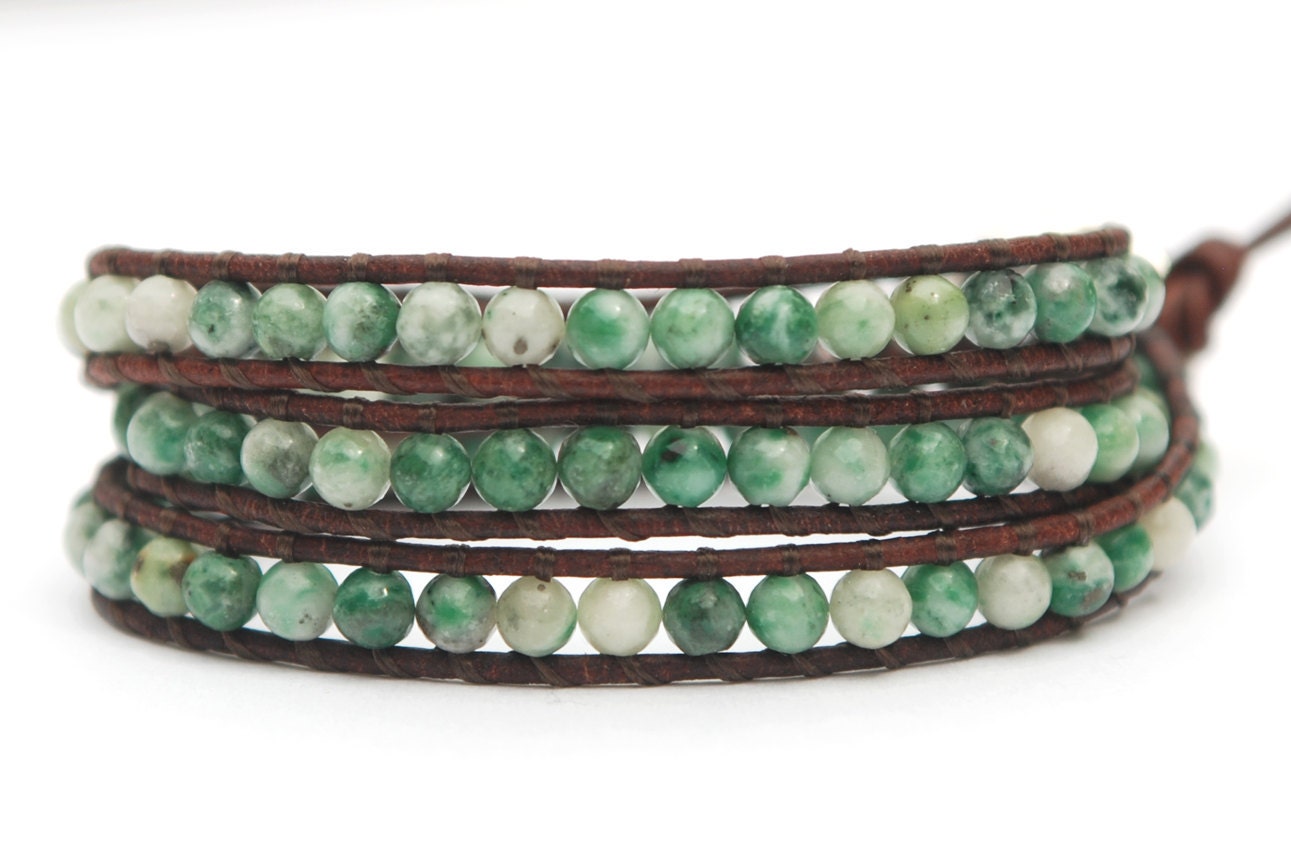 Beaded leather wrap bracelet. Green and white jade triple wrap leather bracelet with solid silver plated button. WSR3v012