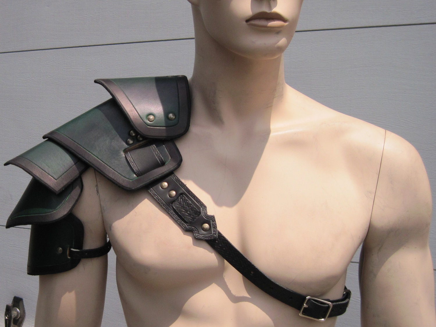 Sentinel segmented leather shoulder armor