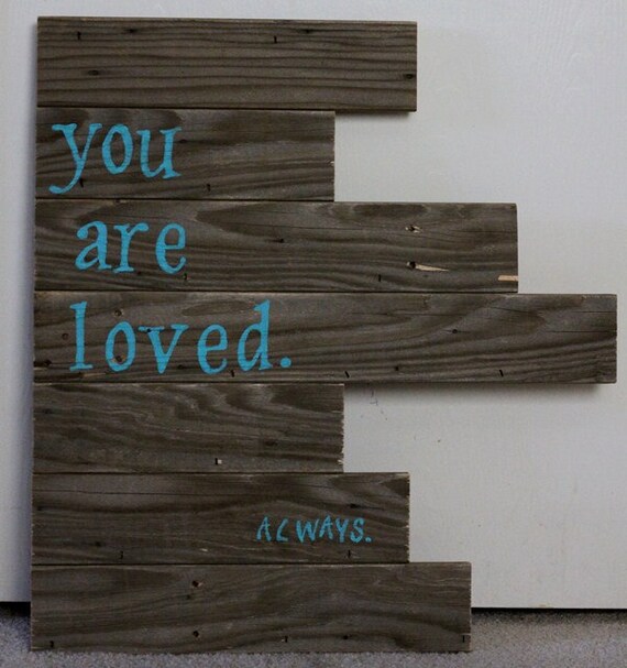 You are loved.  Hand painted sign on reclaimed wood.