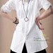 She/shirt/blouse/white/loose/casual/formal